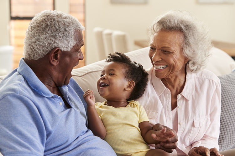 Grandparents spending time with a young child, reflecting the family relationships often involved in guardianship and incapacity planning.
