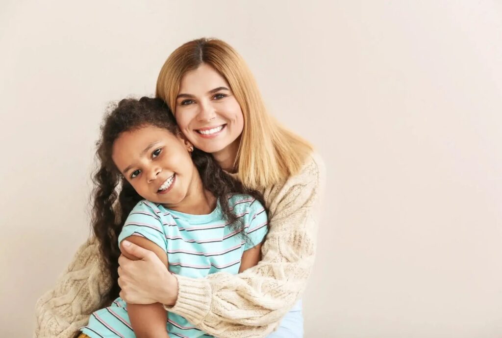 Guardian and child sharing a close moment, reflecting the supportive role of legal guardianship.