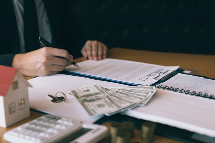 Property tax appeal attorney reviewing real estate documents for a Pennsylvania tax assessment appeal